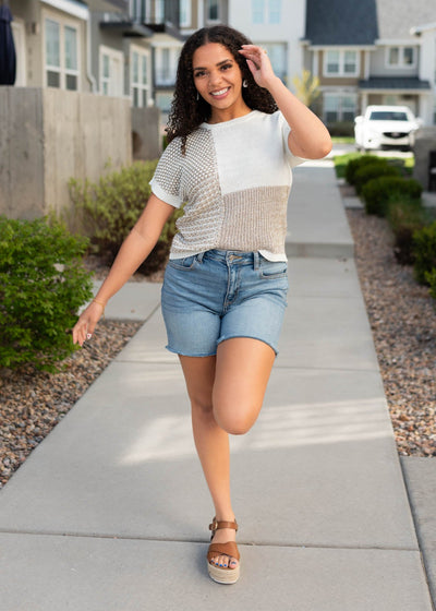 Natural knit sweater top with color block pattern