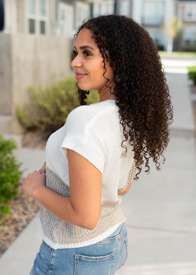 Side view of the natural knit sweater top