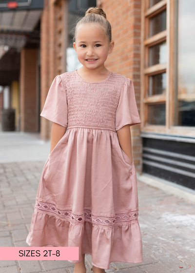 Pocket on the modest blush smocked little girl dress