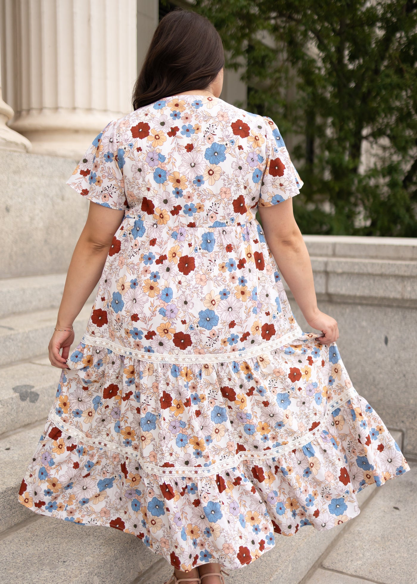 Back view of the plus size lena lou cream floral dress