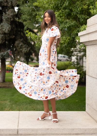 Cream floral dress in size xs to xl