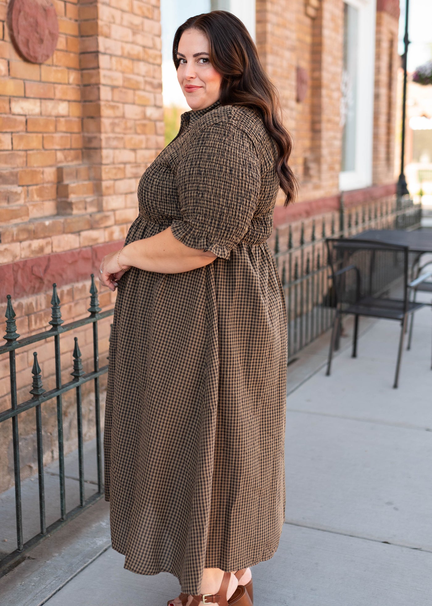 Side view of the modest plus size brown gingham dress