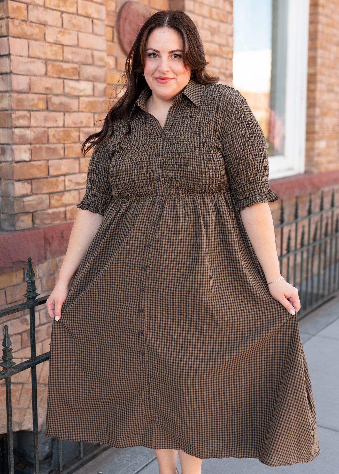 Plus size brown gingham dress with smocket bodice and sleeves