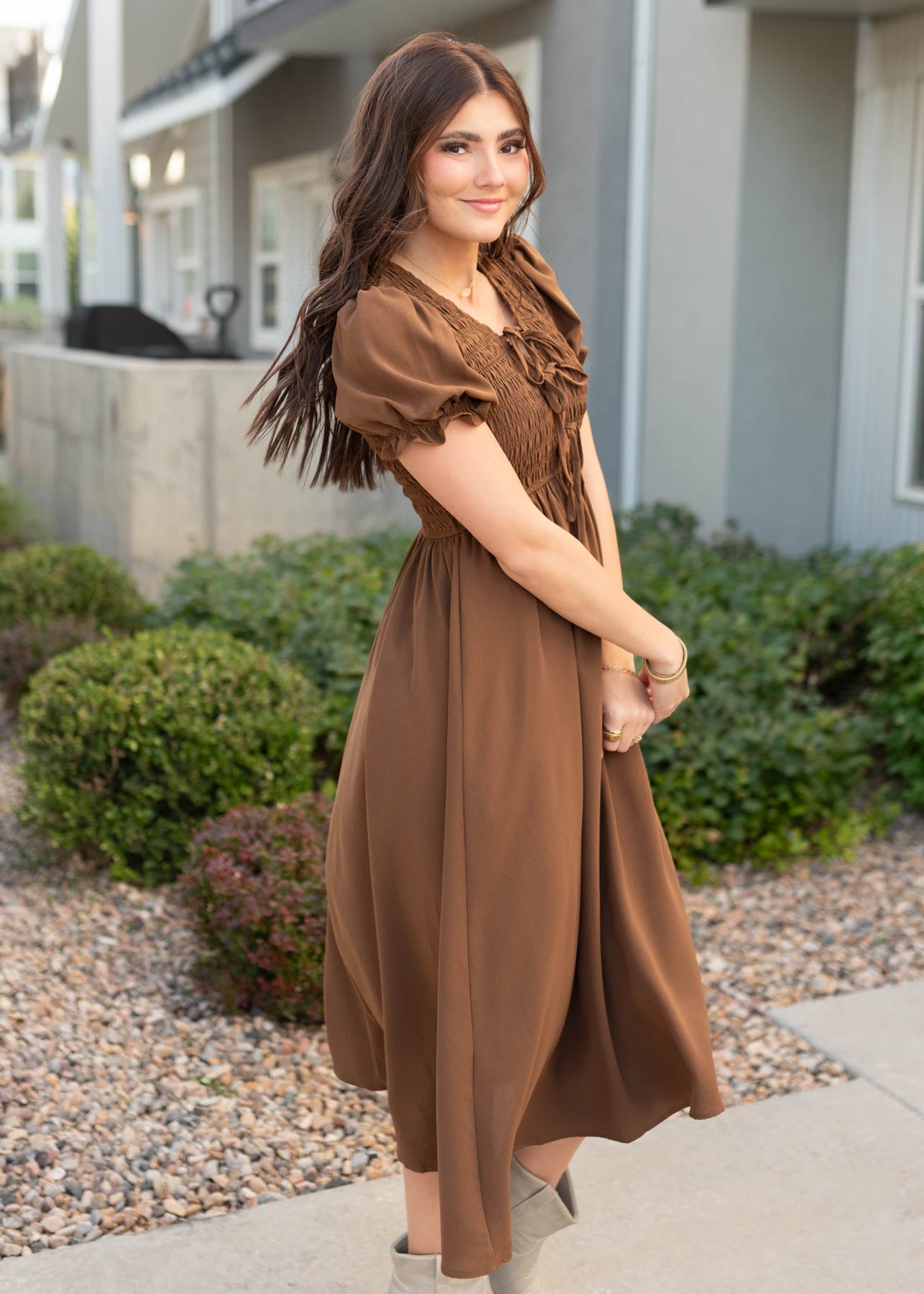 Side view of the cocoa smocked dress
