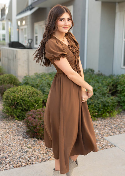 Side view of the cocoa smocked dress