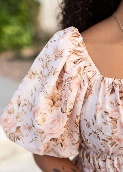 Close up of the fabric and sleeve on the pink floral dress 