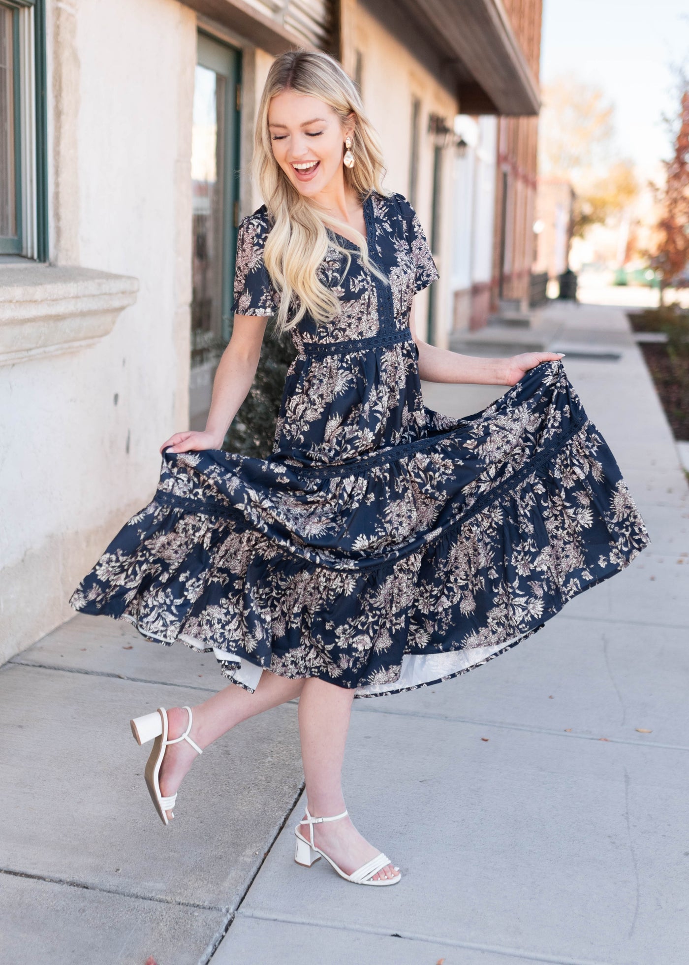 Blue lace trim on the navy blue patterned dress