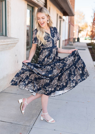 Blue lace trim on the navy blue patterned dress