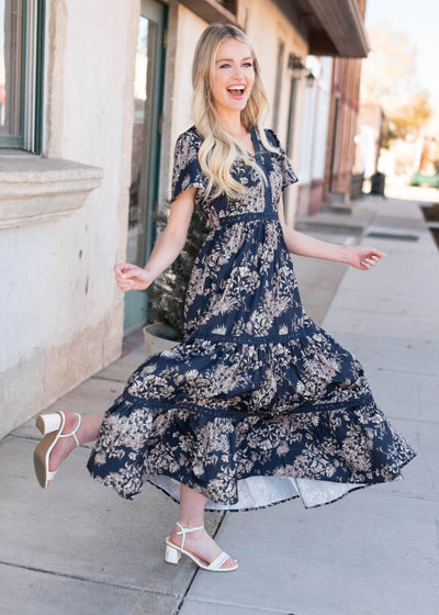 Navy blue patterned dress with lace trim and short sleeves