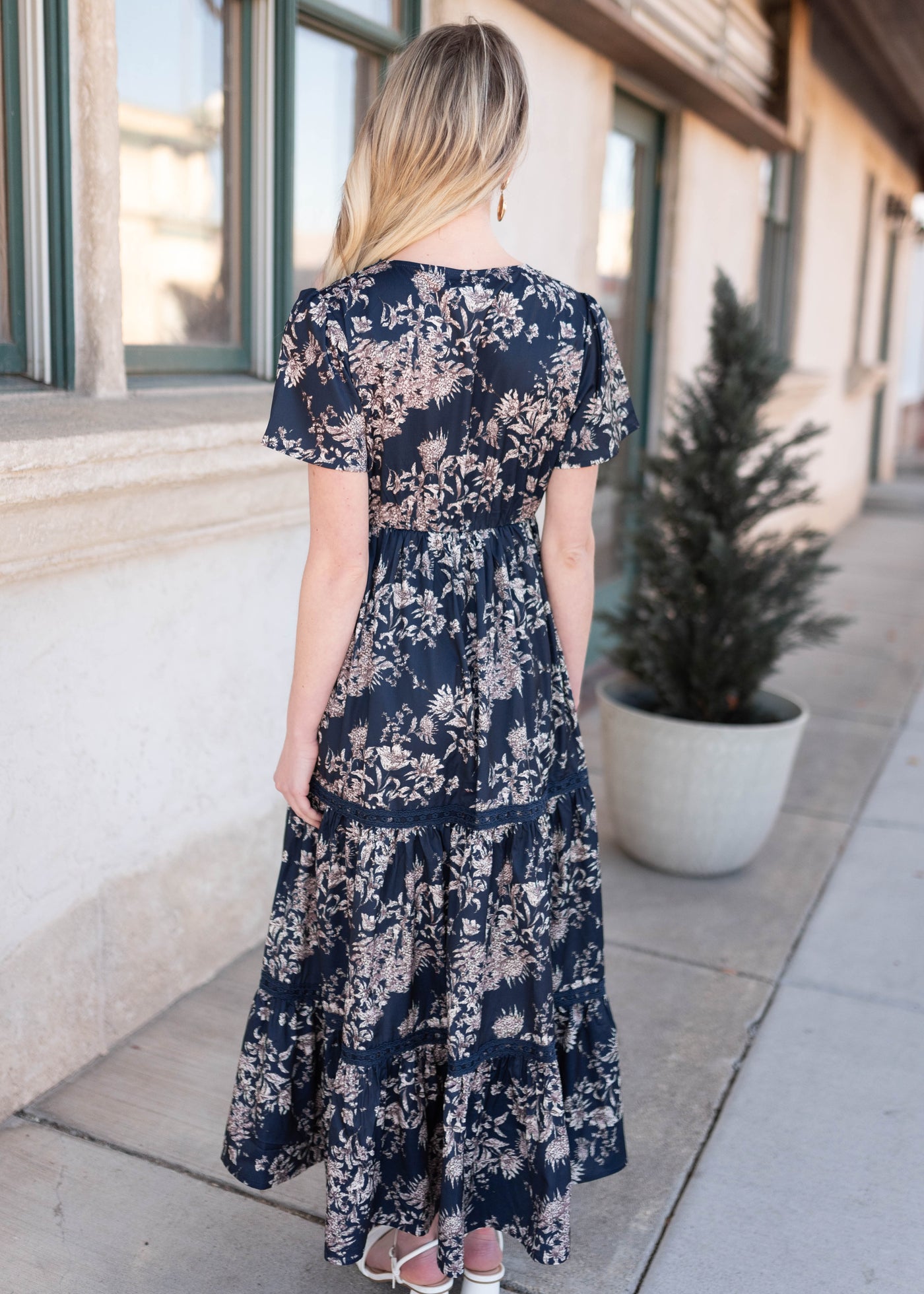 Back view of the navy blue patterned dress