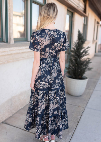 Back view of the navy blue patterned dress