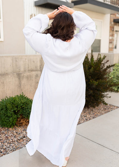 Back view of the white embroidered bodice dress in plus size