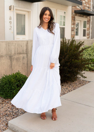 White embroidered bodice dress with long sleeves