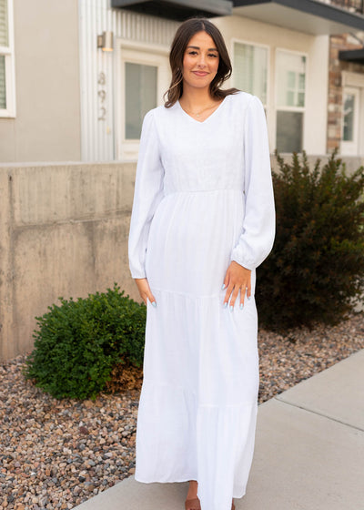Long sleeve white embroidered bodice dress