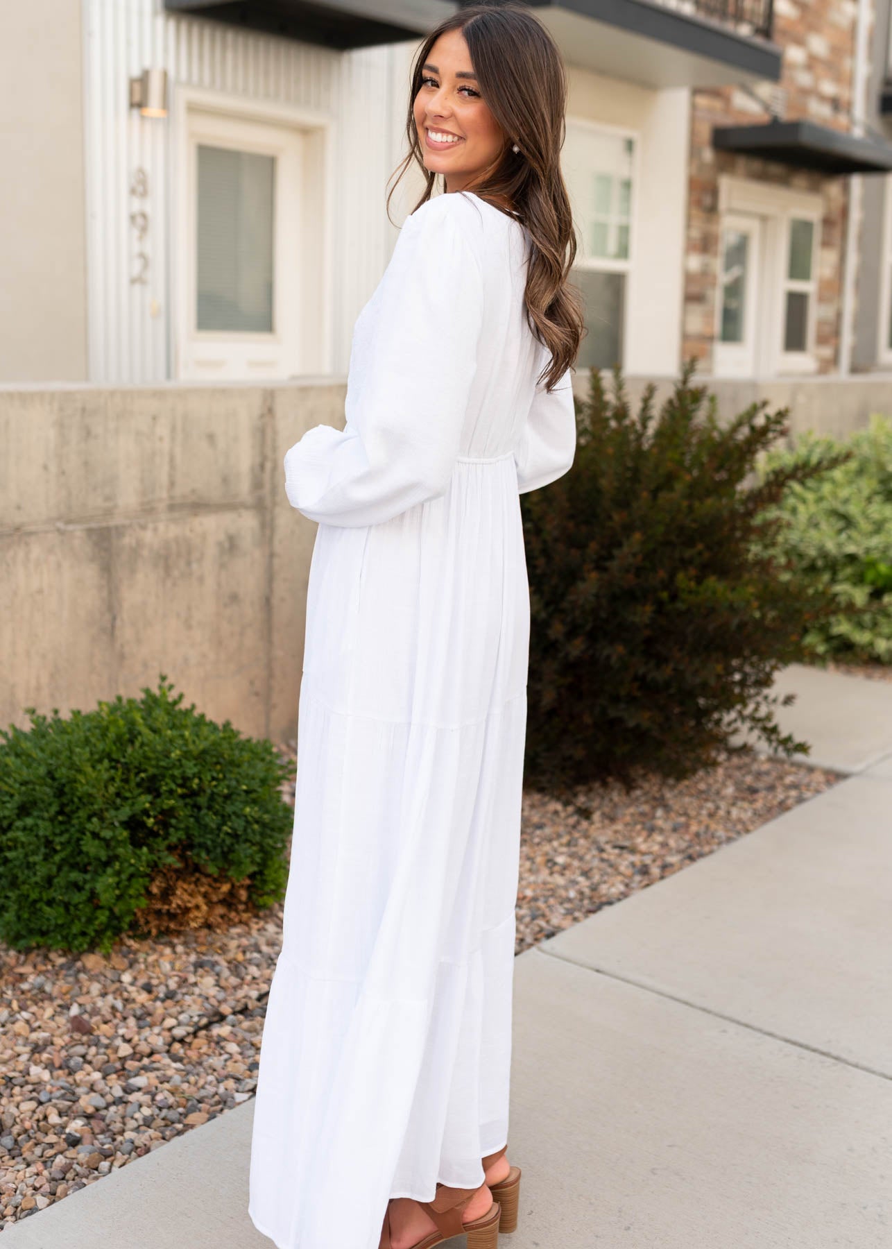 Side view of the white embroidered bodice dress