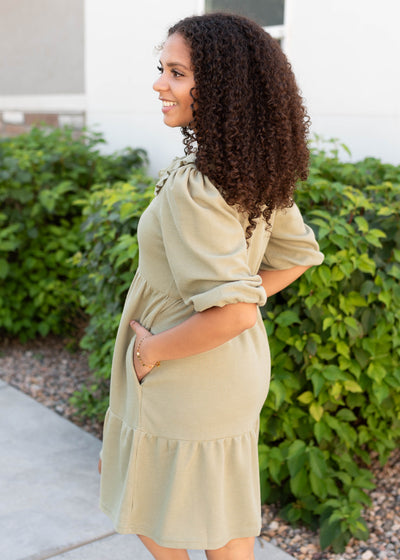 Side view of the dusty sage collar dress with pockets