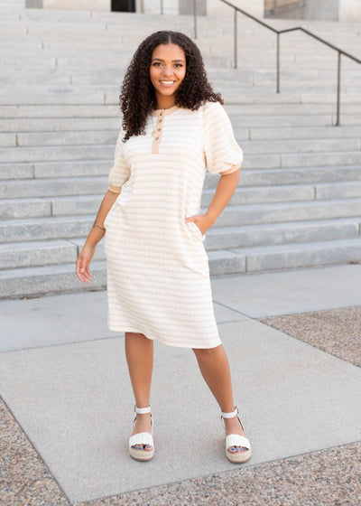Beige striped dress with pockets