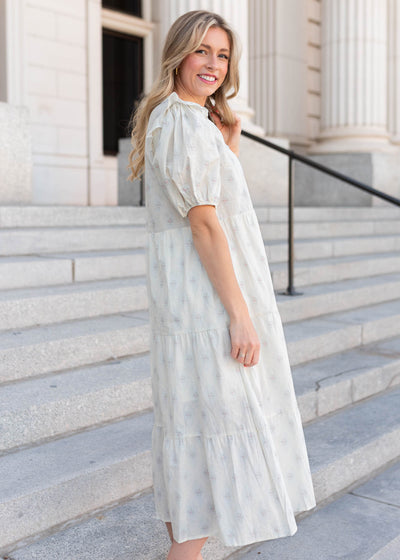 Side view of the vintage cream floral dress