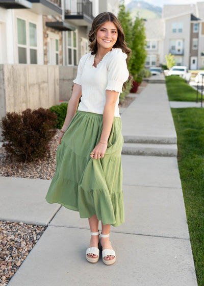 V-neck ivory top with short sleeves