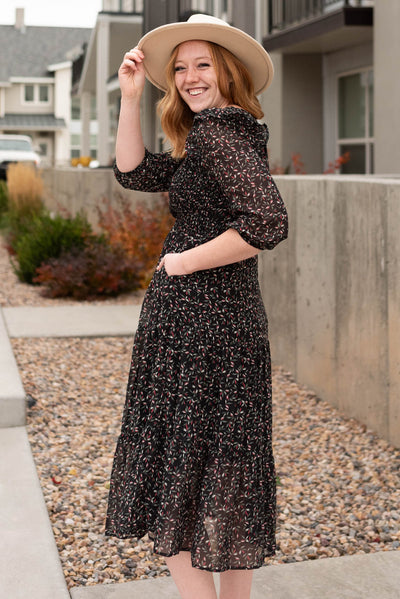 Side view of the black floral dress