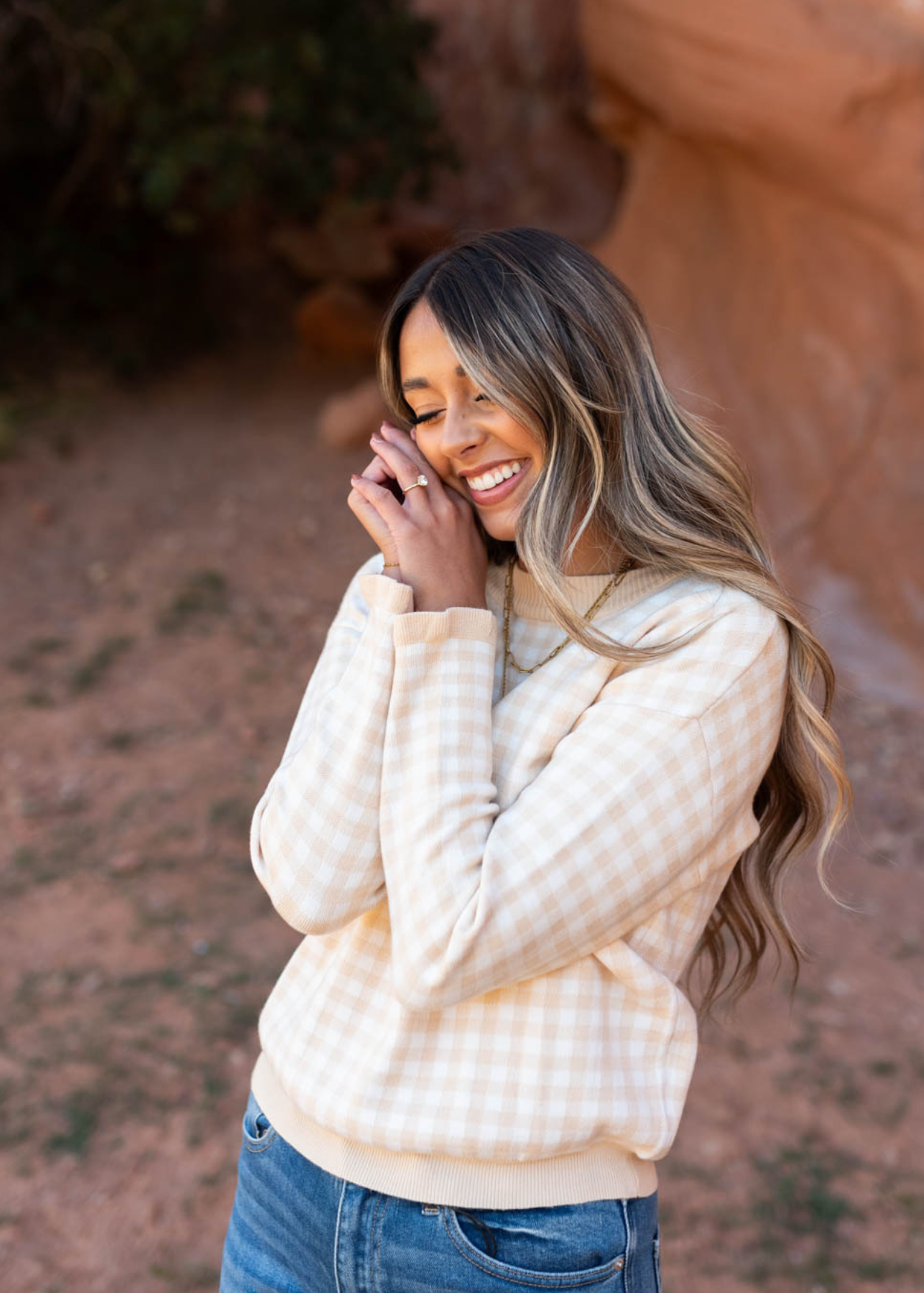 Ivory sweater with a checkered pattern