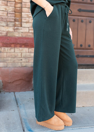 Side view of the forest green bottoms