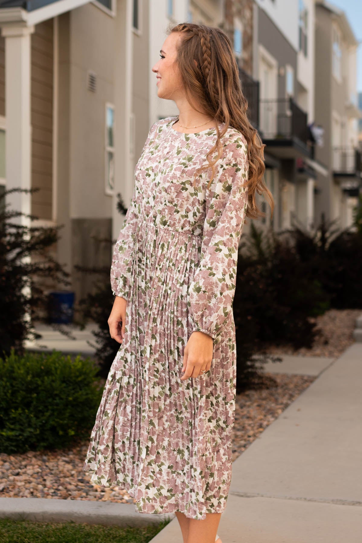Side view of a mauve floral dress