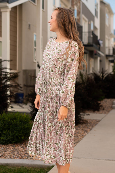Side view of a mauve floral dress
