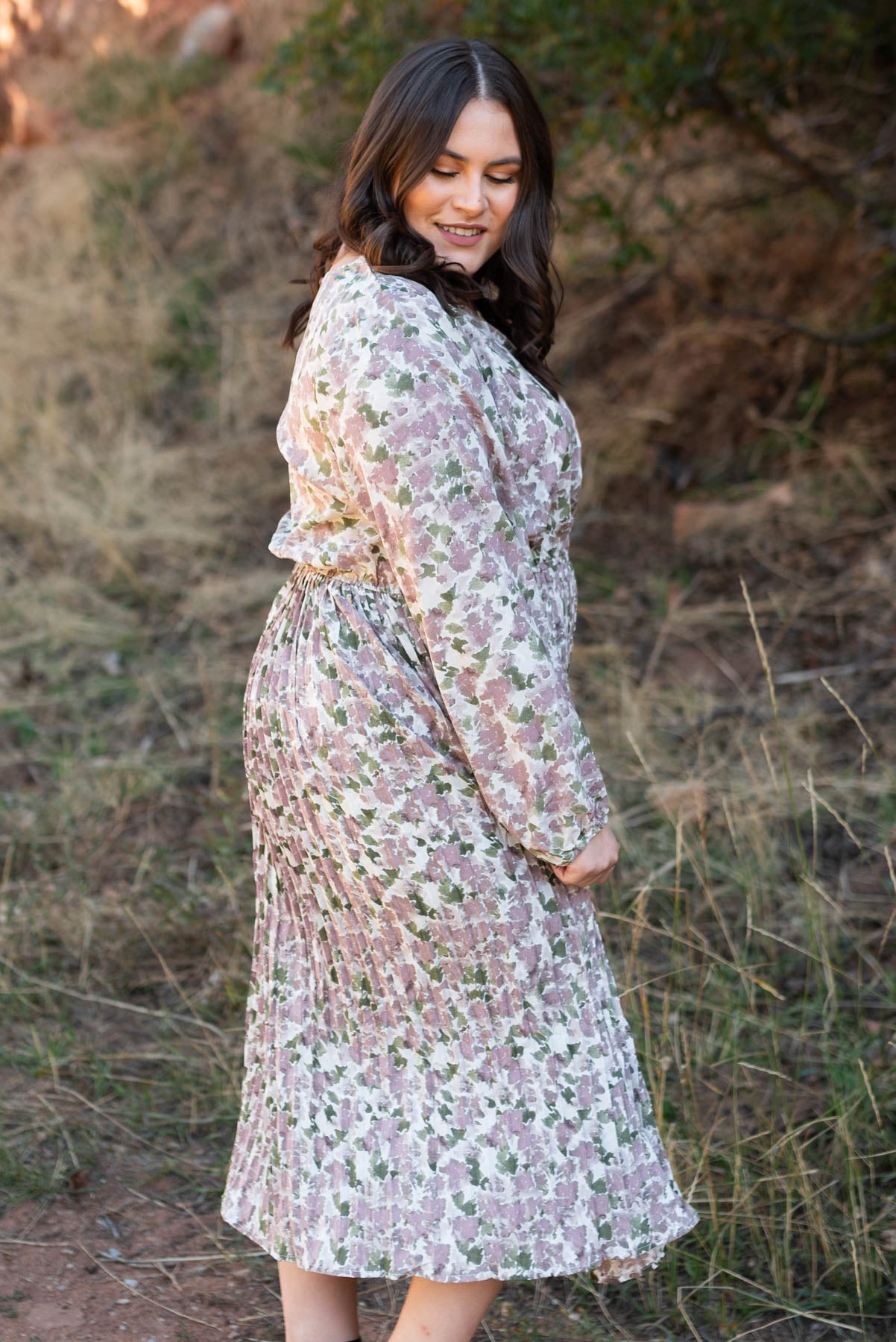 Side view of a mauve floral dress