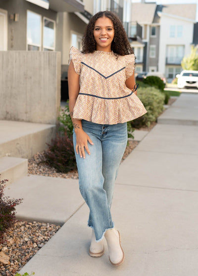 Taupe floral top at Lena Layne with ruffle at the waist
