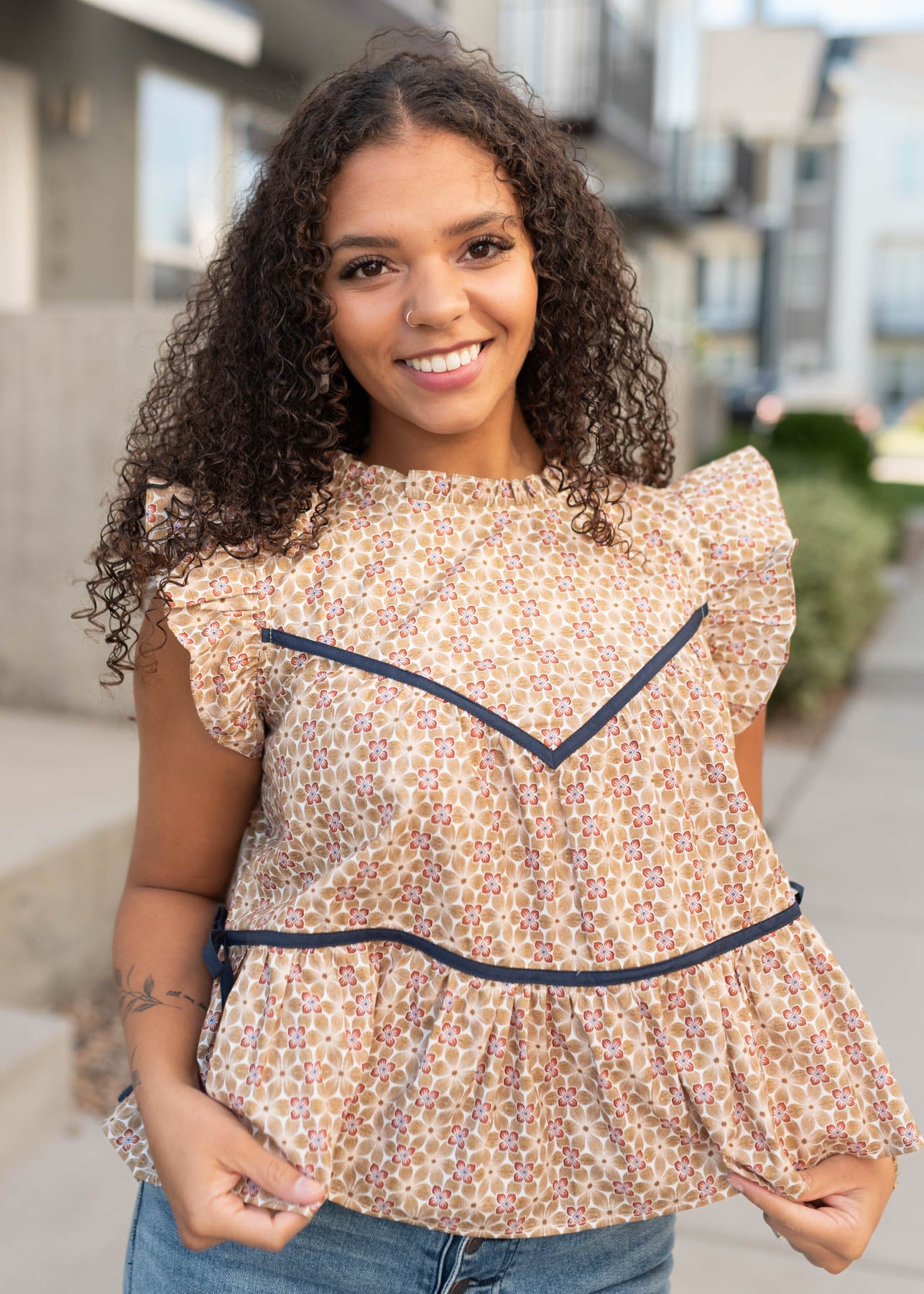 Modest sleeveess taupe floral top with navy trim