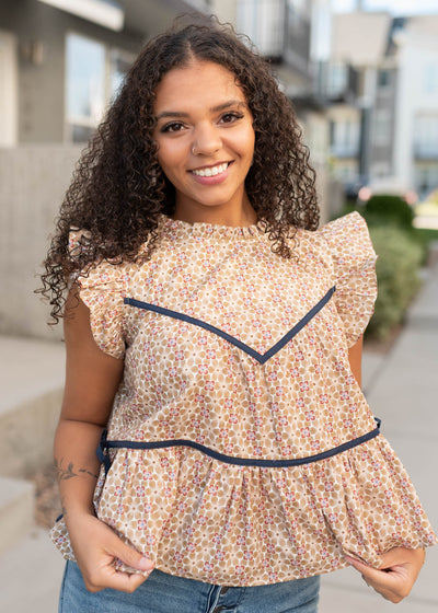 Modest sleeveess taupe floral top with navy trim