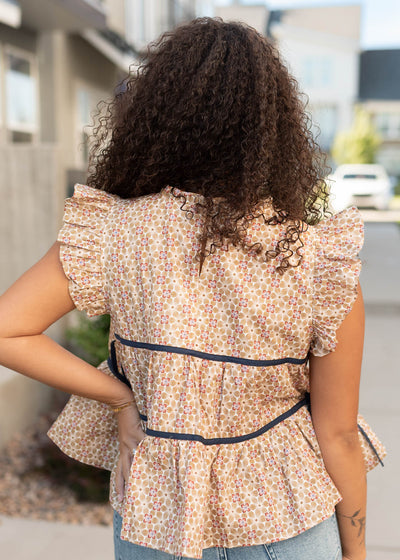 Back view of the taupe floral top