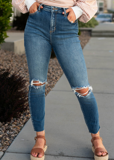 Dark denim high rise distressed jeans