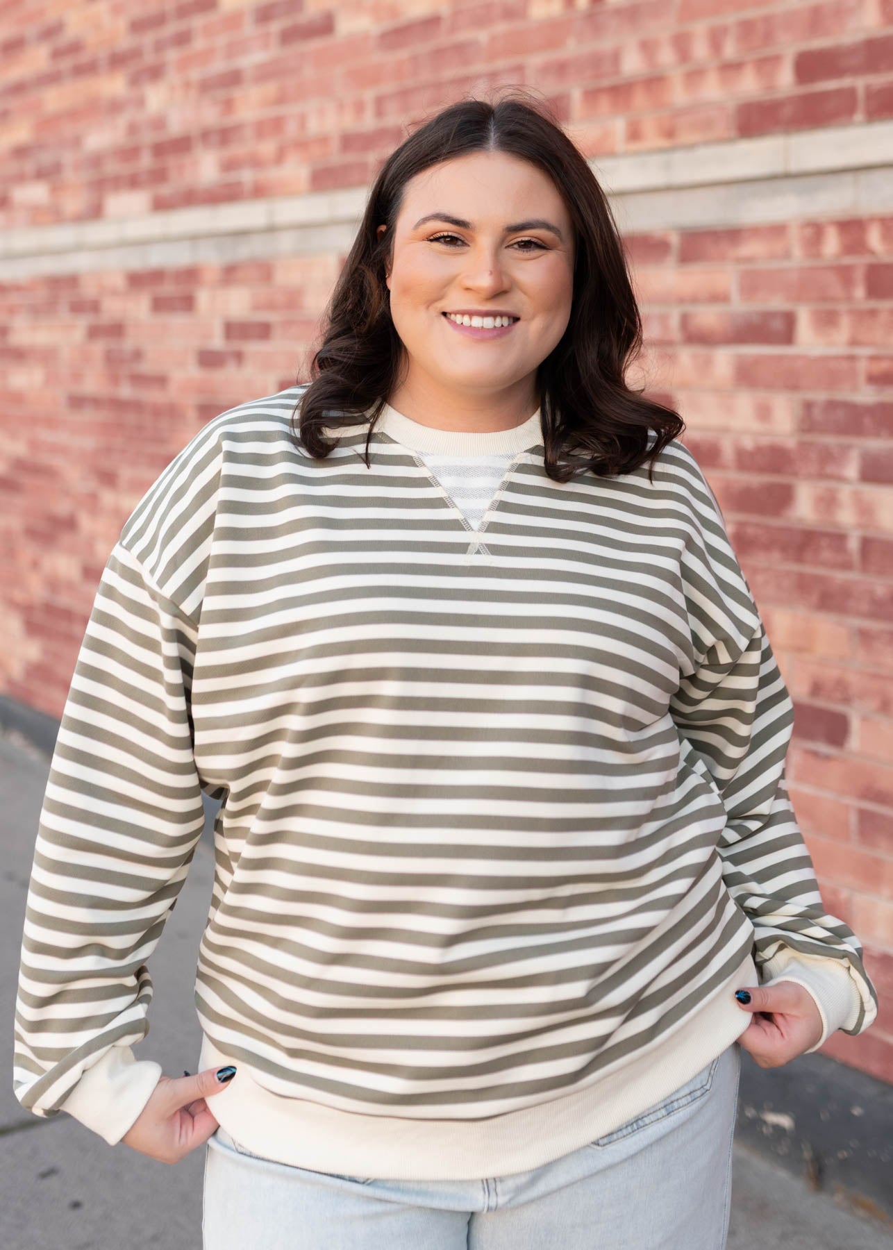 Cute plus size olive striped sweatshirt with ivory cuffs and waist band