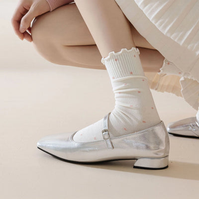 Side view of the white polka dot socks