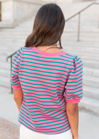 Back view of the pink and teal striped top