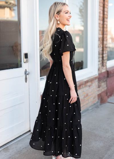 Side view of the black polka dot dress