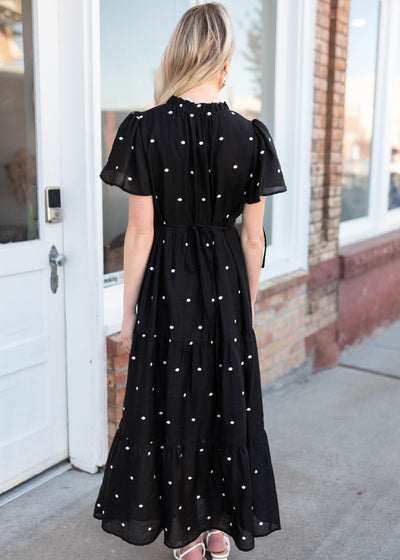 Back view of the black polka dot dress