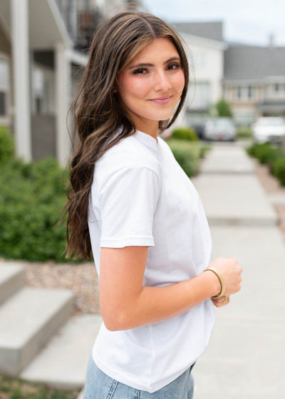 Side view of the white basic tee