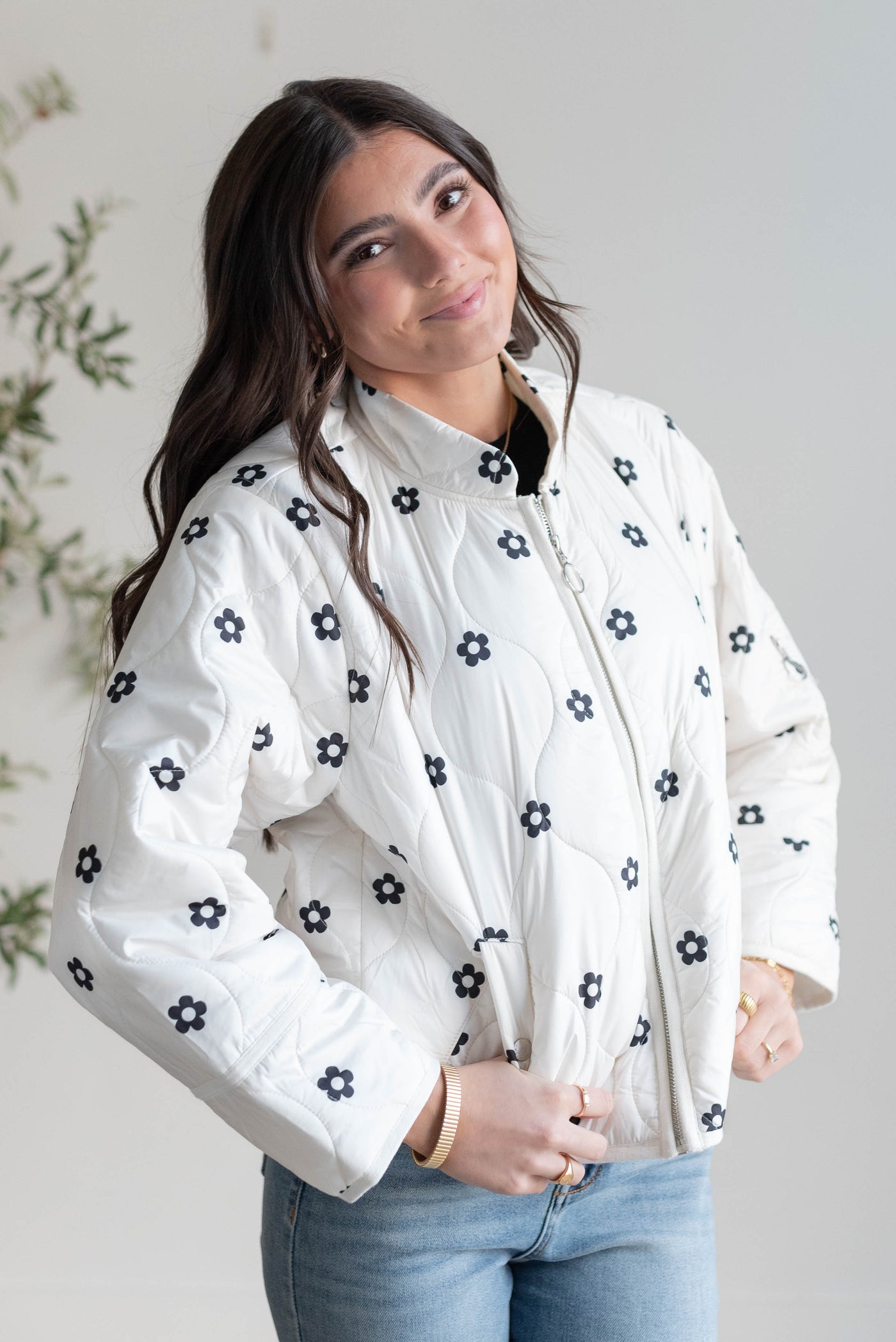 Black flowers on the ivory fower puffer jacket