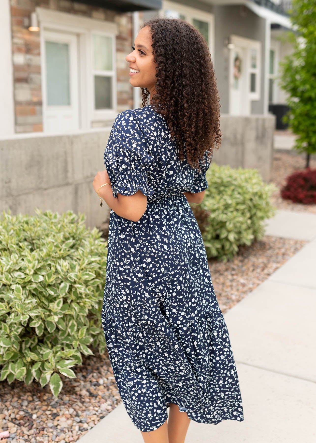 Side view of the navy floral dress