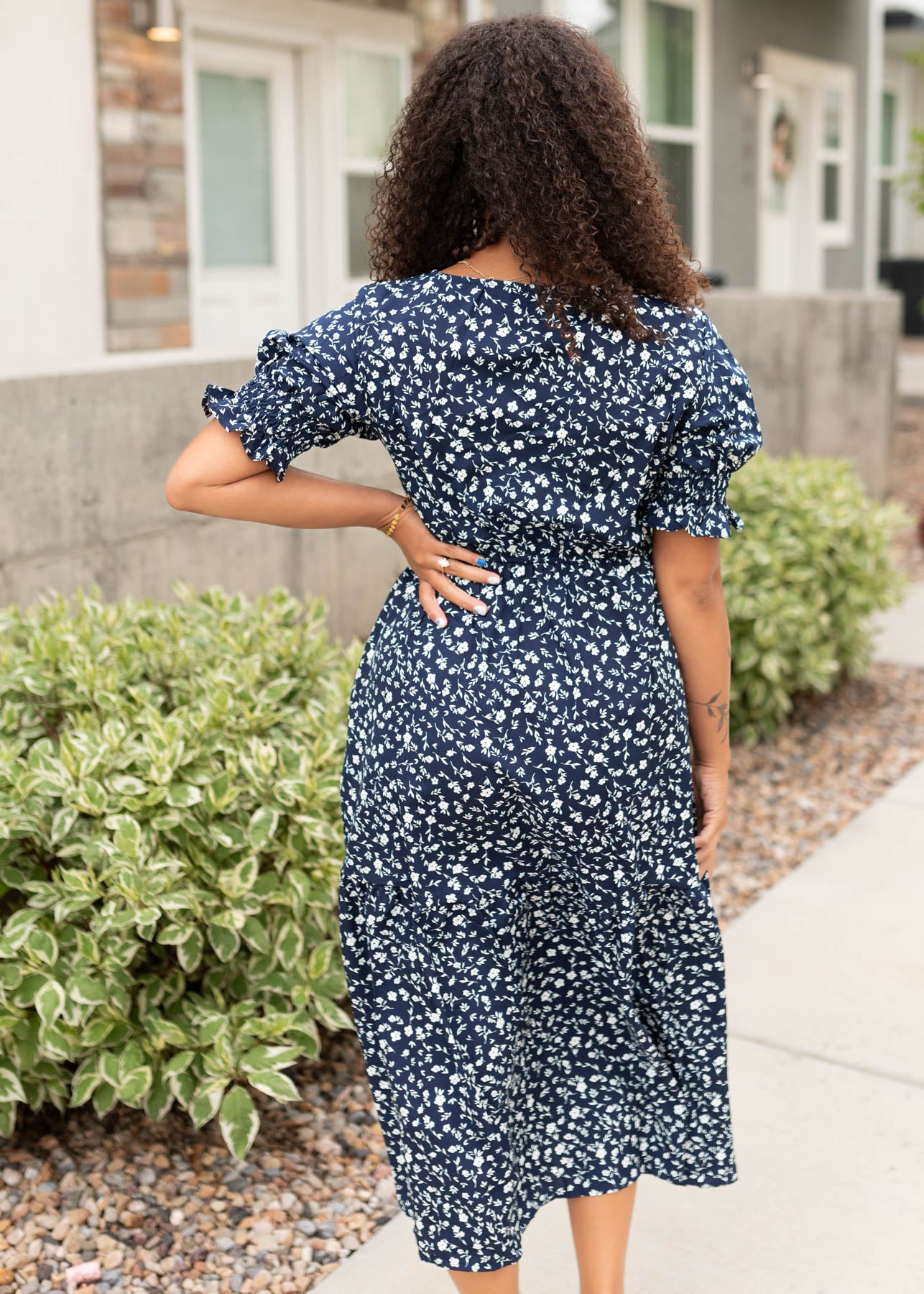 Back view of the navy floral dress