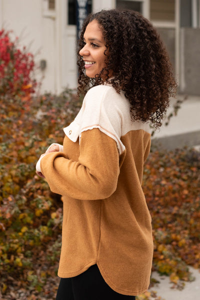 Side view of the gold top