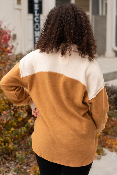 Back view of the gold top