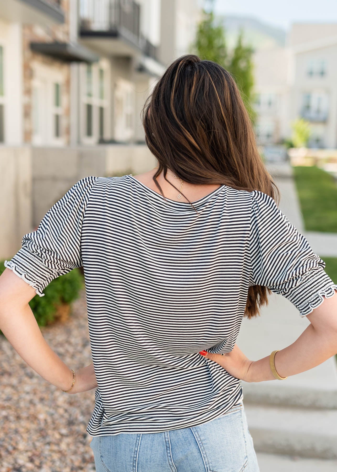 Back view of the navy striped top
