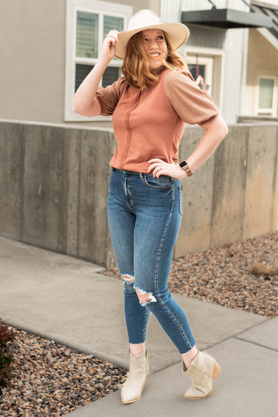 Multi fabric short sleeve cinnamon top with stitching detail in front