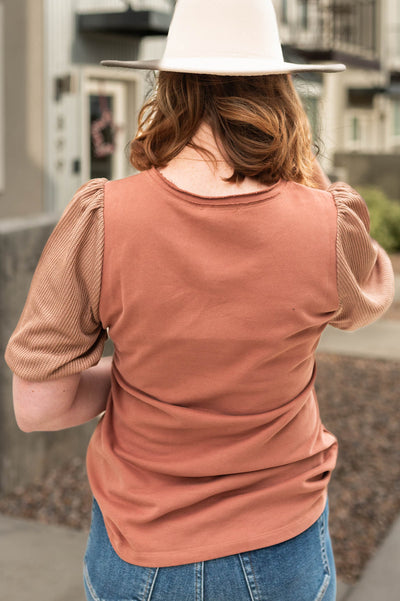Back view of a cinnamon top