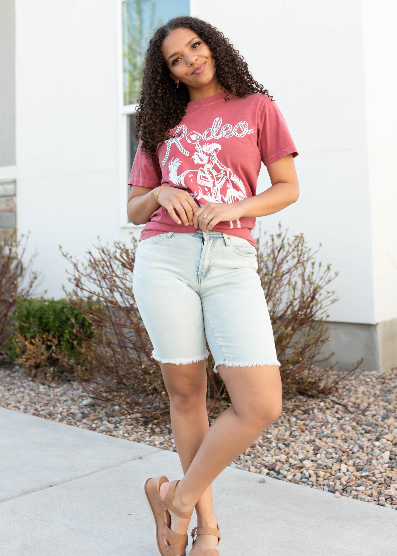Rose colored rodeo cowgirl graphic tee