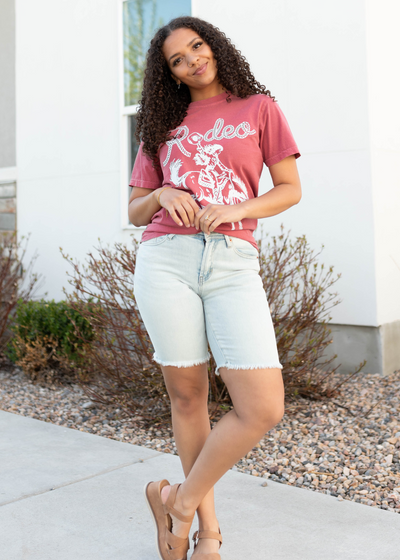 Rose colored rodeo cowgirl graphic tee